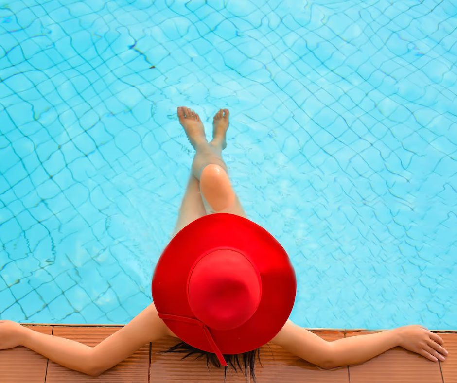Woman relaxing in pool.